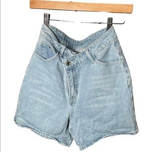 Light blue shorts. 2 buttons